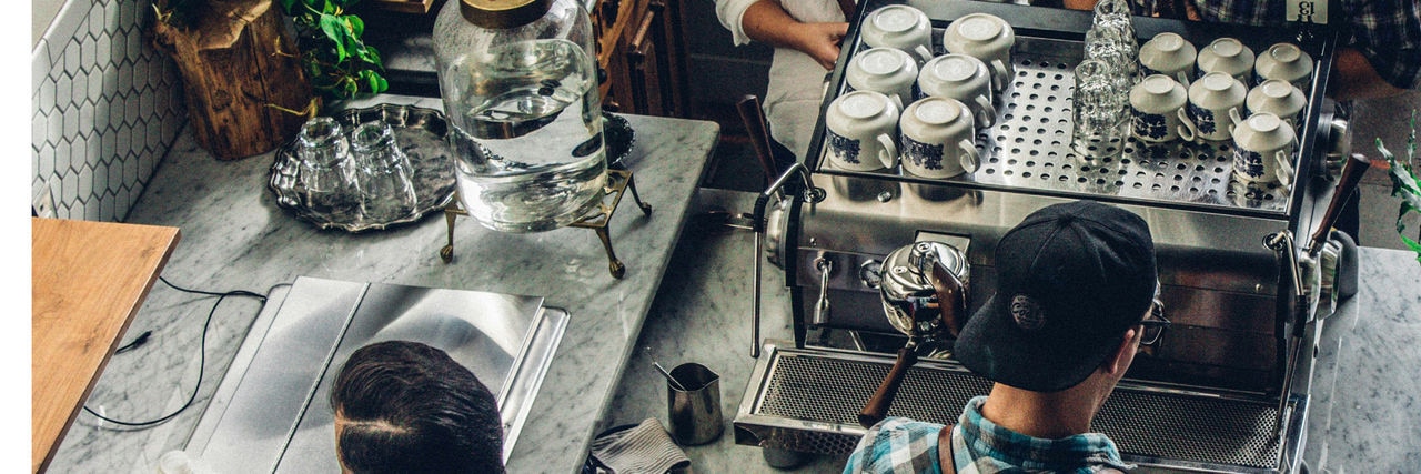aerial view of barista making coffee