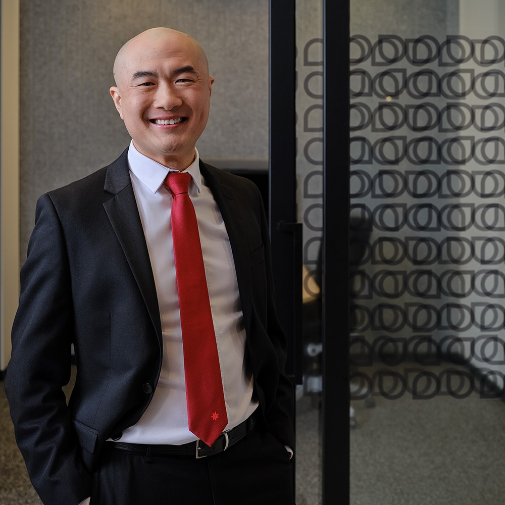 Male banker smiling